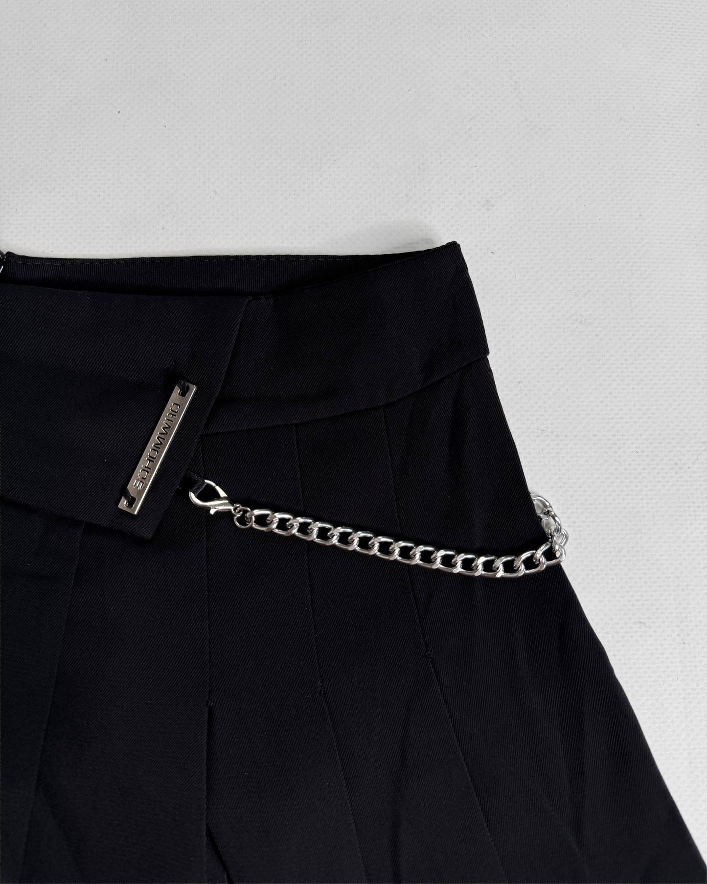 Black office siren mini skirt with chain details