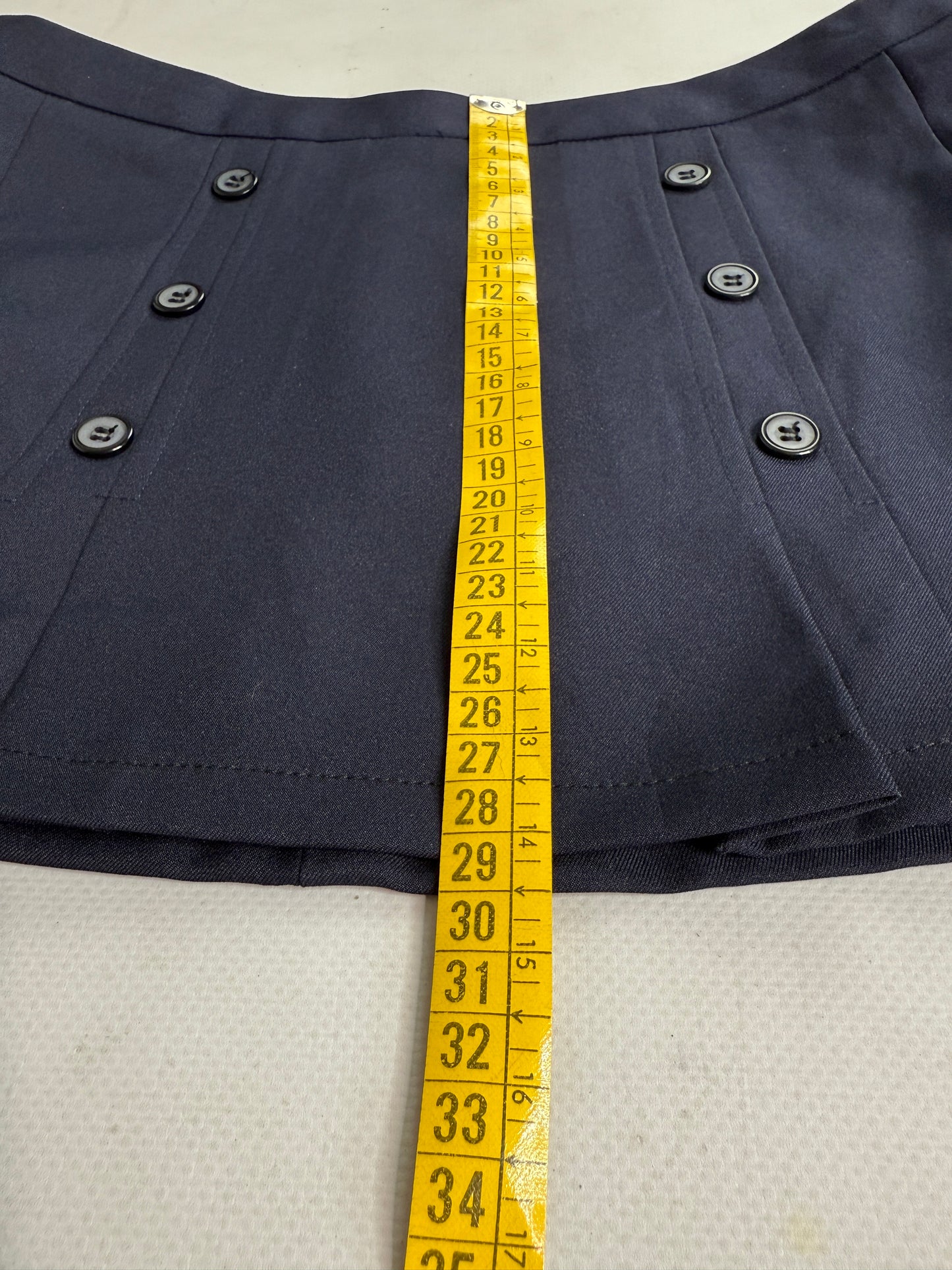 Navy office siren mini skirt button details