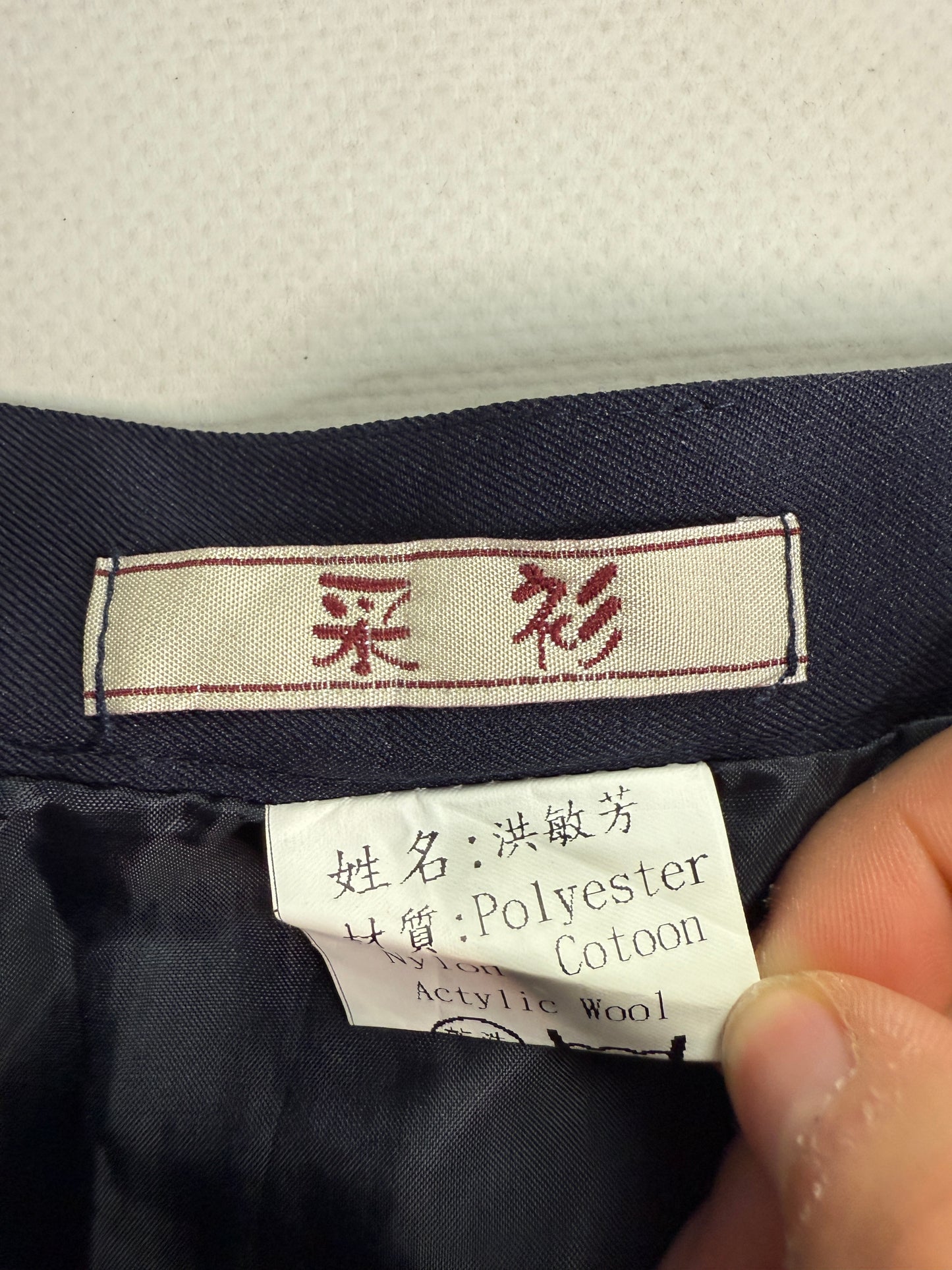 Navy office siren mini skirt button details