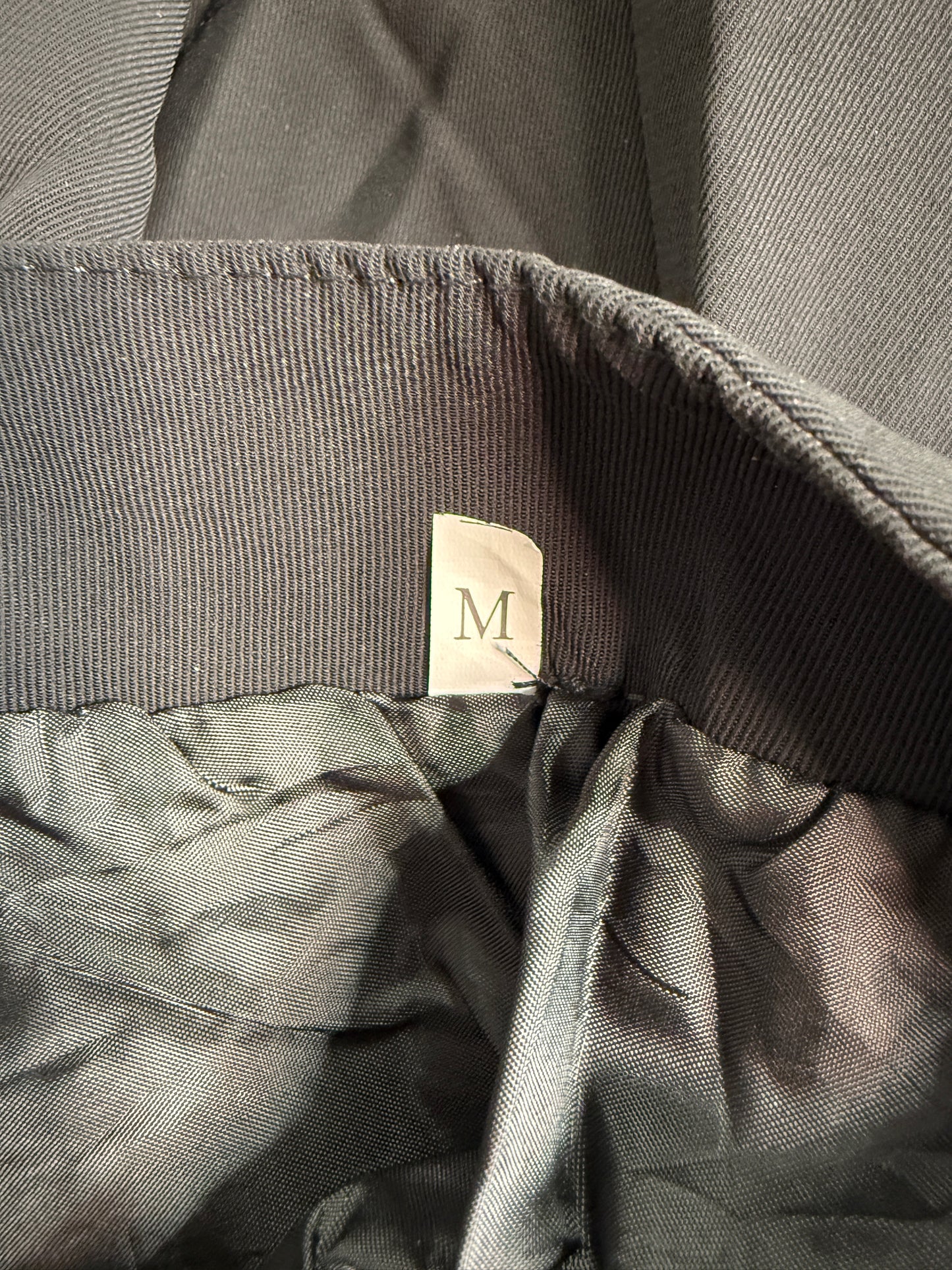 Black office siren mini skirt with chain details