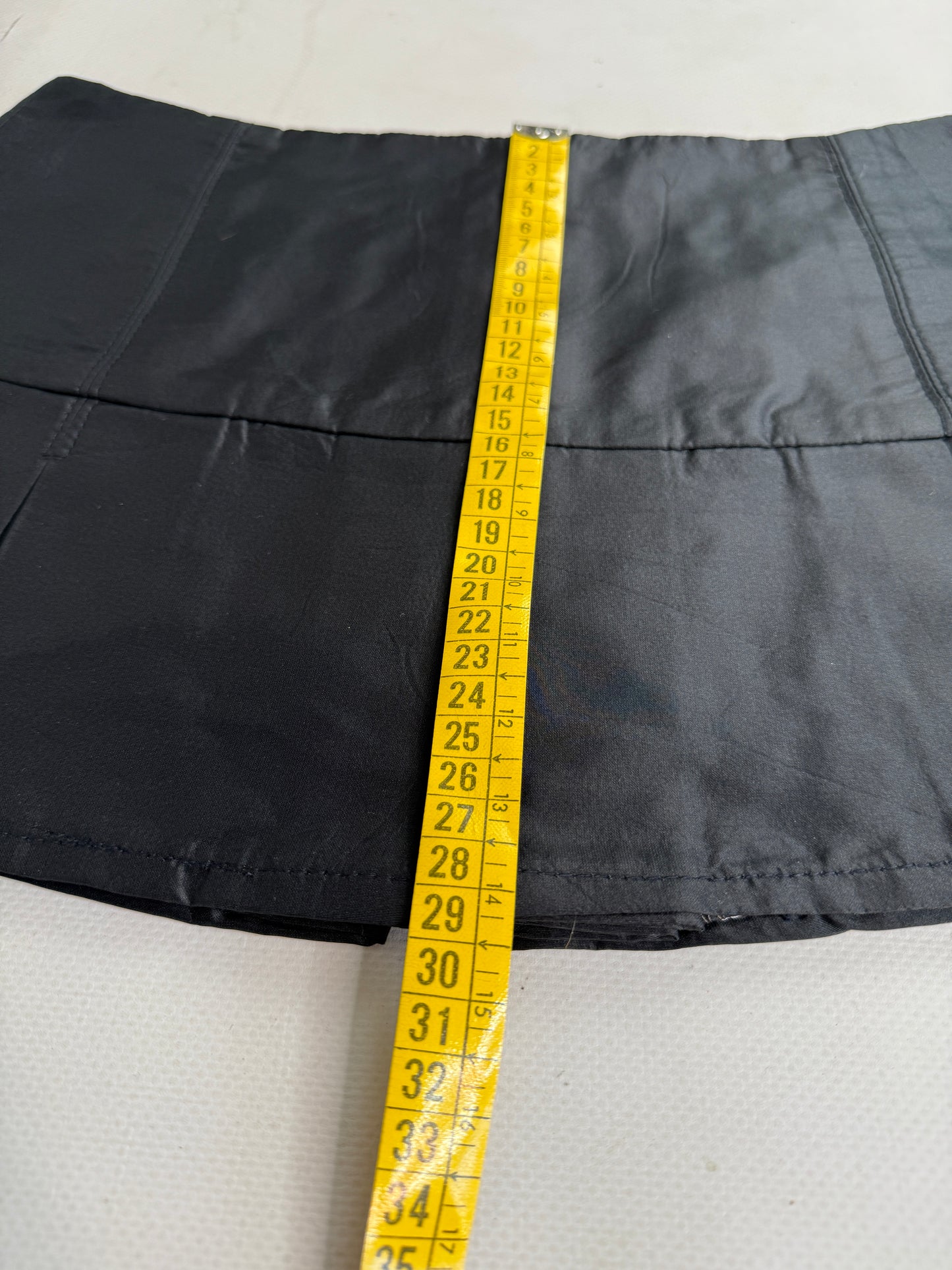 office siren pleated mini skirt Black