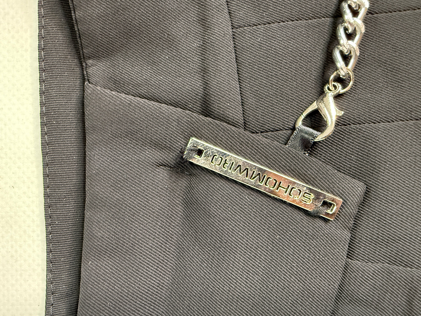 Black office siren mini skirt with chain details