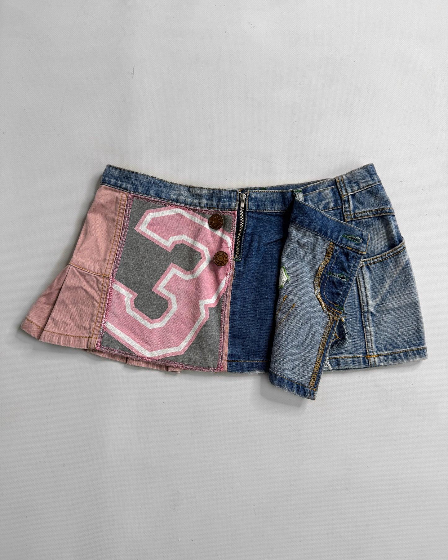 2000s graphic denim mini skirt